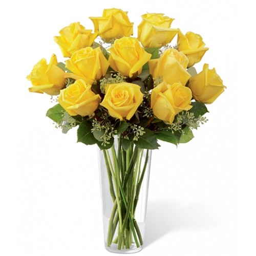 The yellow roses at the heart of this bouquet symbolize the bright success and joy that graduation brings. Paired with the soft, silvery hues of seeded eucalyptus and rich, lush greenery, the arrangement reflects the balance of hard work, growth, and the 