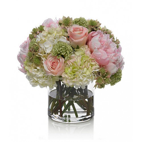 Eye-catching display of peonies, hydrangea & roses perfectly arranged in vase which makes beautiful & lasting impression.