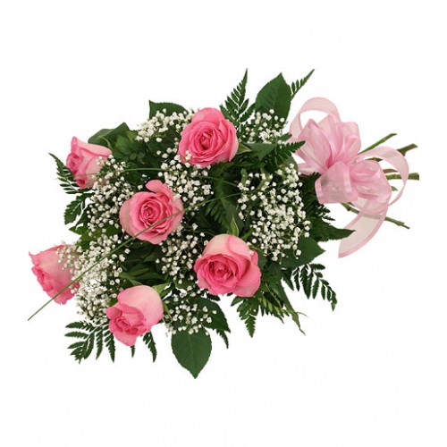 Beautiful bouquet of six pink roses with ample flowering white baby's breath plus lush greens and matching pink bow.
