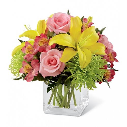 Congratulate your special recipient on a job well done. A colorful celebratory flower arrangement to add to the festivitie of their happy day.