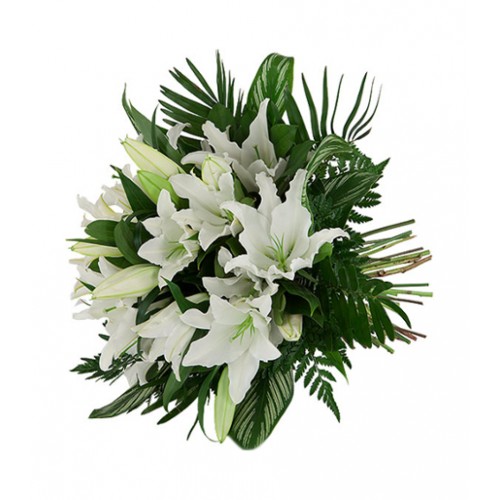 Beautiful hand-tied bouquet of several white lilies with assorted, lush greenery. 